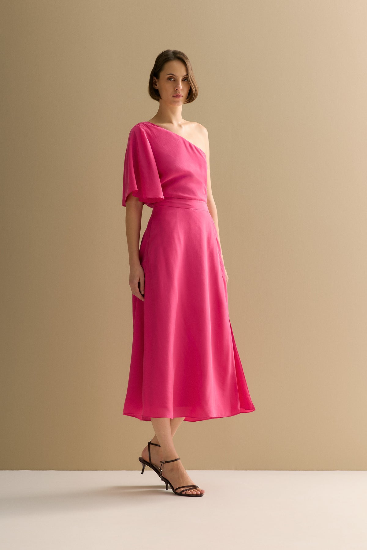 Asymmetric Sleeve Draped Top